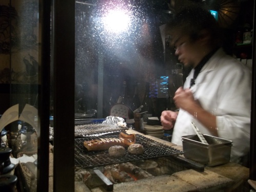 It was sake night at this izakaya and I remember eating grilled squid at some point. I can't find a picture of the squid on a plate (maybe because I never took one...). But here it is on the grill...
